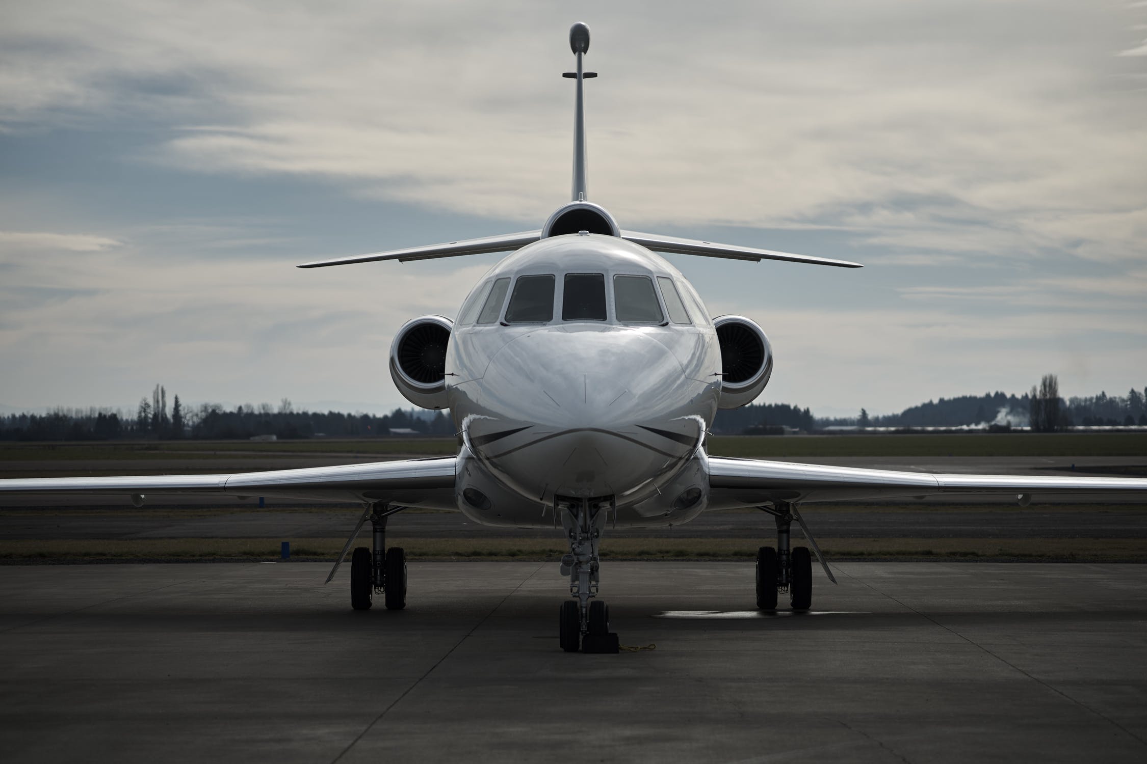 A big, white-colored private jet